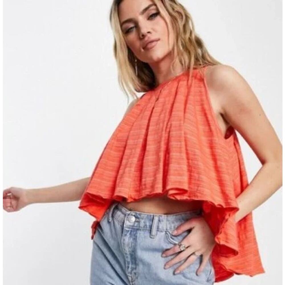 Free People Turn It Up Swing Oversized Sleeveless Hi-Low Blouse in Scarlet Ibis